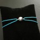 Bracelet cordon bleu turquoise boule argent 925/000 ajustable