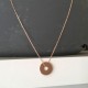 Collier Plaqué Or rose 18 carats pendentif donut sur chaine ajustable