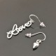 Boucles d'oreilles décalées coeur love argent 925/000 Tendance du moment