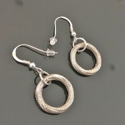 Boucles d'oreilles argent 925/000 pendantes anneaux torsadés