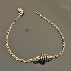 Bracelet plaqué or 18 carats perle cristal noir filigrané