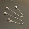 Boucles d'oreilles étoiles pendantes chainettes en argent 925/000