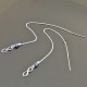 Boucles d'oreilles longues chainettes symbole infini en argent 925/000 